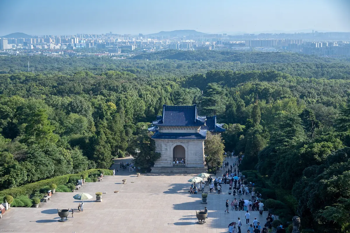 View down the Sun Yat-sen Mausoleum steps over the forest of Purple Mountain toward Nanjing